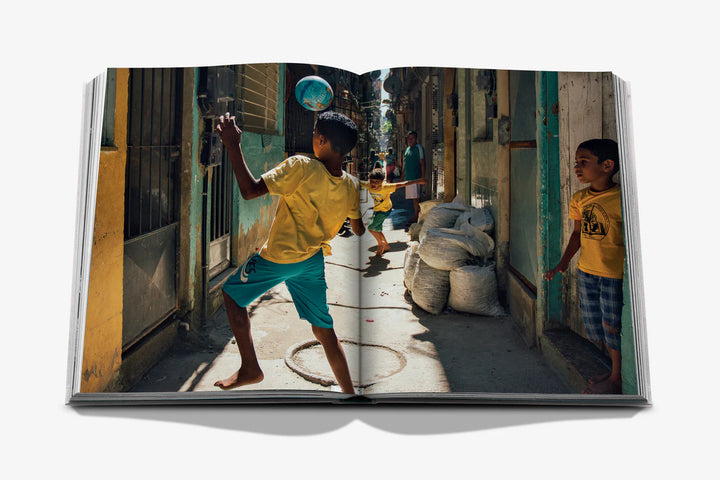 Football Roots: The Spirit of the Game Book Print Books Assouline