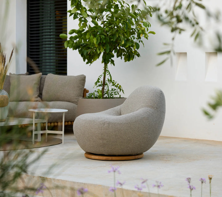 Gem lounge chair w/teak swivel Chairs Cane-line