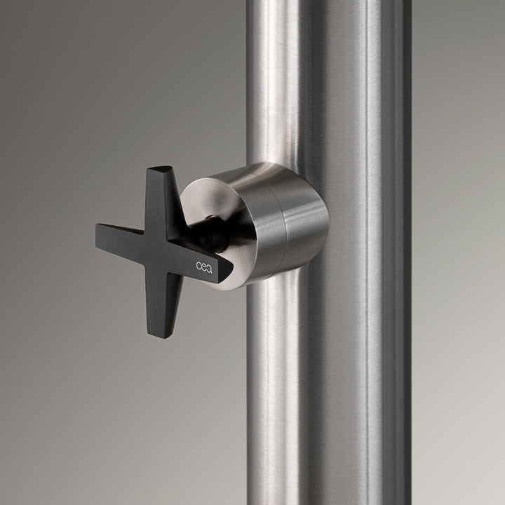 Bold Free-standing outdoor shower in AISI 316L stainless steel. Outlet disk with rain jet in Delrin® black matt, controlled by progressive mixer of CROSS collection in Black Diamond matt finish