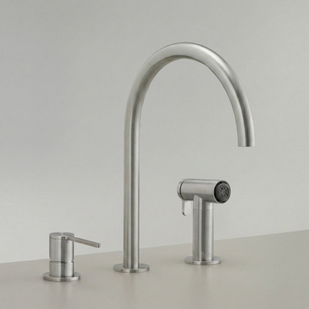 Three Hole Mixers With Pull Out Hand Shower Three-hole mixer with swivelling spout H. 300 mm and pull-out hand shower with automatic undertop diverter