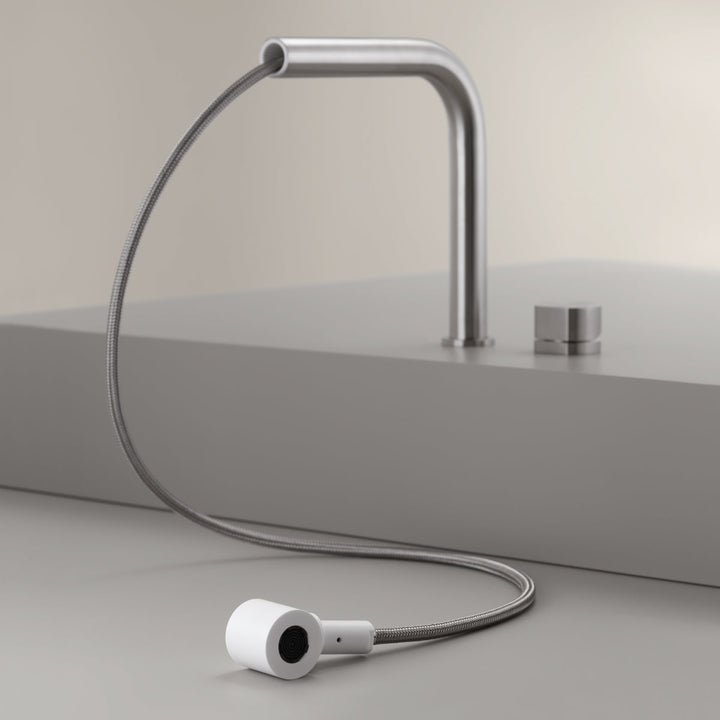 Neutra Deck mounted swivelling spout with pull-out Delrin® hand shower. Removable spout for under-window installation